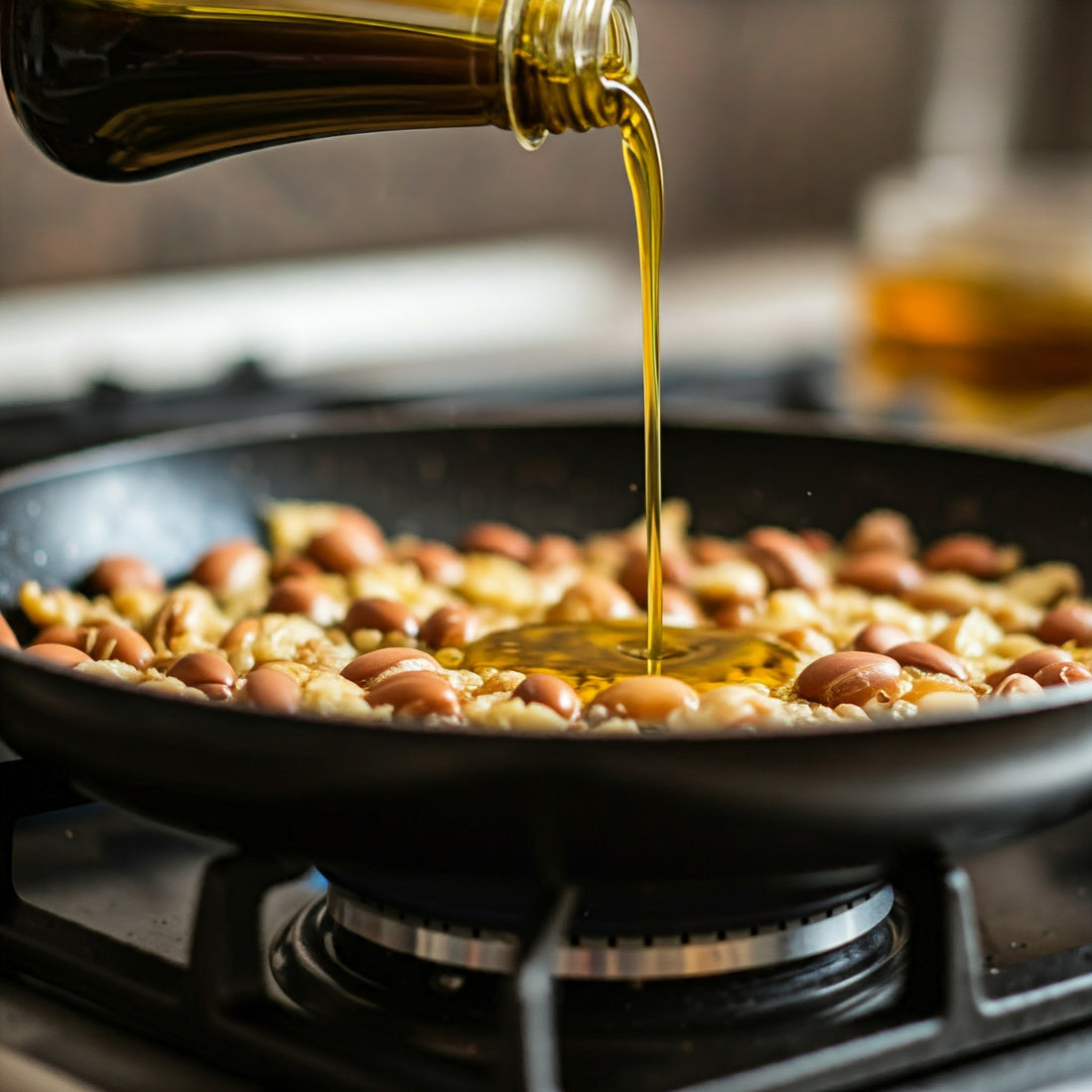 pooring argan oil for cooking in a pan