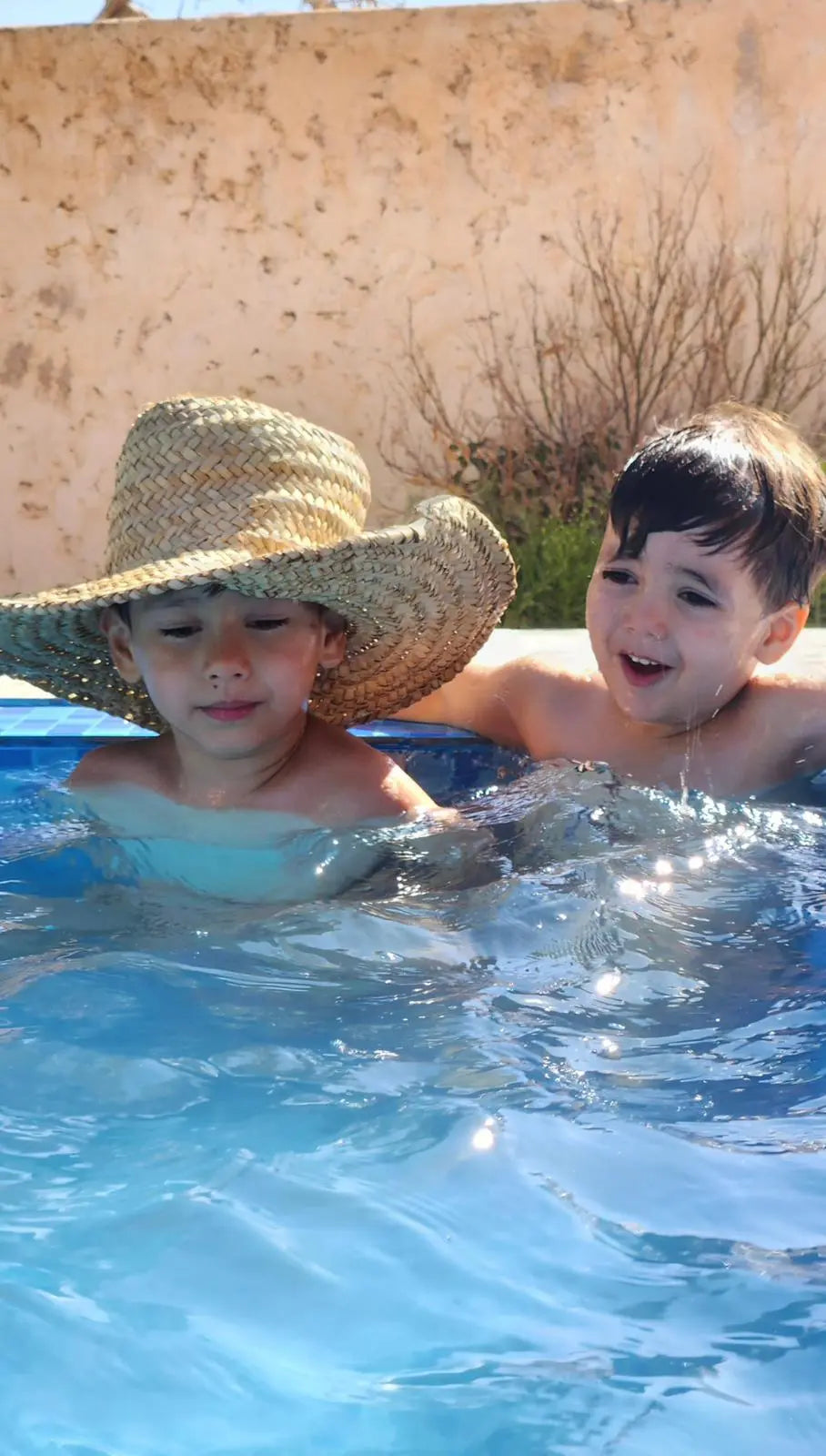 Children enjoying the swimming pool at Dar Cherfa