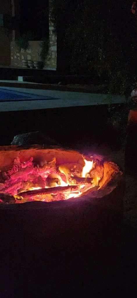 An evening fire gathering at Dar Cherfa